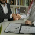 Two people sharing a handshake
